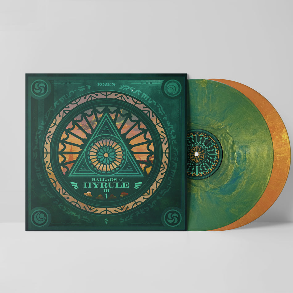 Ballads of Hyrule III vinyl featuring green and orange artwork reminiscent of a stained glass window with a triforce. The records are sticking out of the jacket, one green marble, one orangish gold.