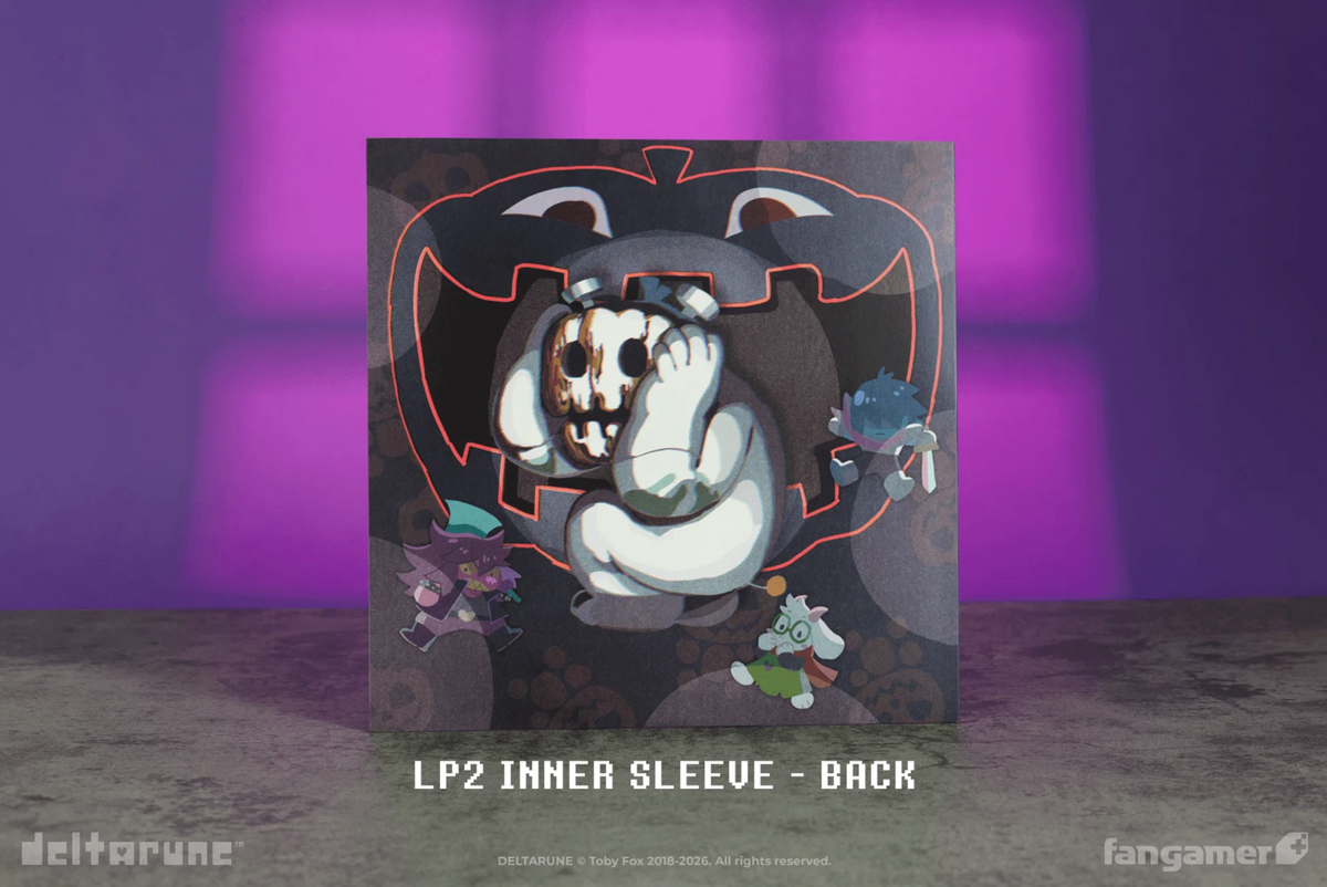 Inner sleeve 2's back has a dark scheme with many jack o lanterns in the background, a larger jack o lantern character, and the 3 main characters interacting with it.