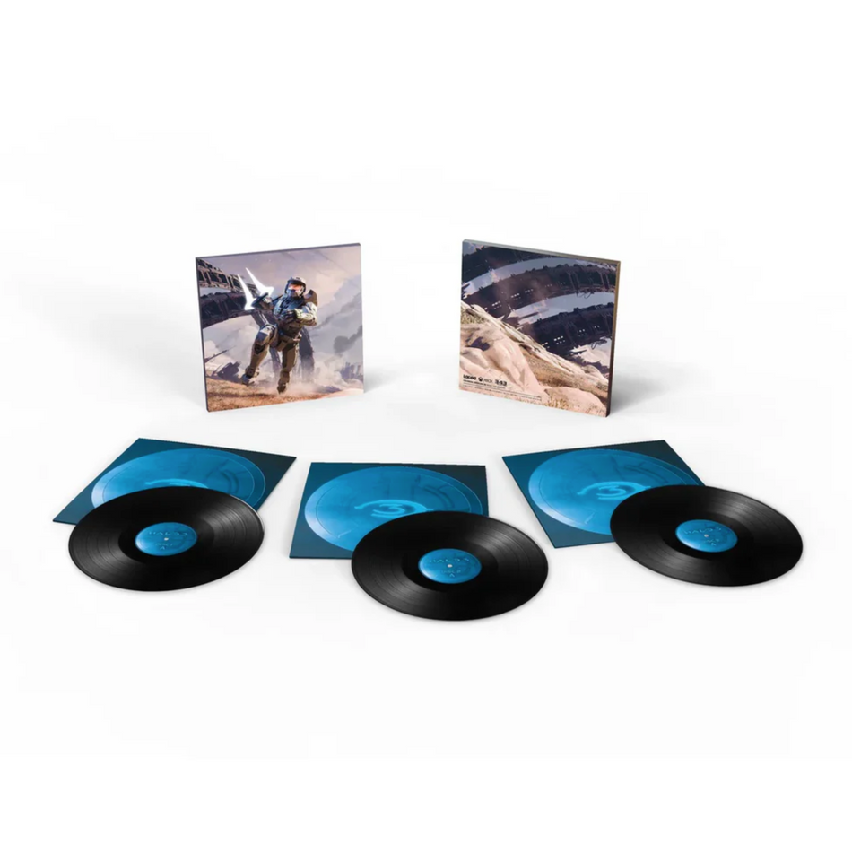 The front and back cover of the Halo 3 vinyl jackets and the front of the inner sleeves and black discs. The sleeves are all different shades of blue with the Halo 3 "3" on them.