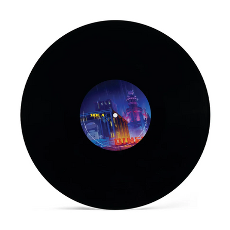 A black vinyl record for Lego Batman with a colorful cityscape-style center label featuring blue, purple, and orange tones, shown on a plain white background.