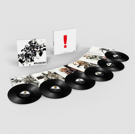 Metal Gear Solid vinyl box set with the front and back of the box on display, one side having black and white illustrations and the other having a large red exclamation point, and then all the illustrative jackets spread out with the black records on top partially.