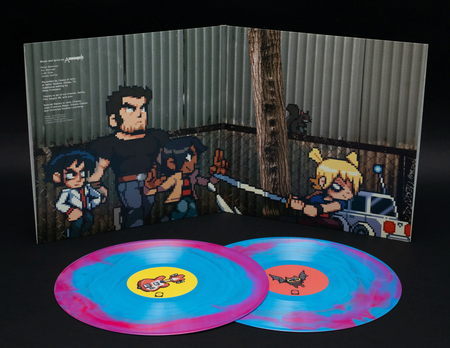 A vinyl record album shown open with two marbled blue and pink records in front. The gatefold cover art depicts pixel art characters in a dark outdoor scene with a real photograph.