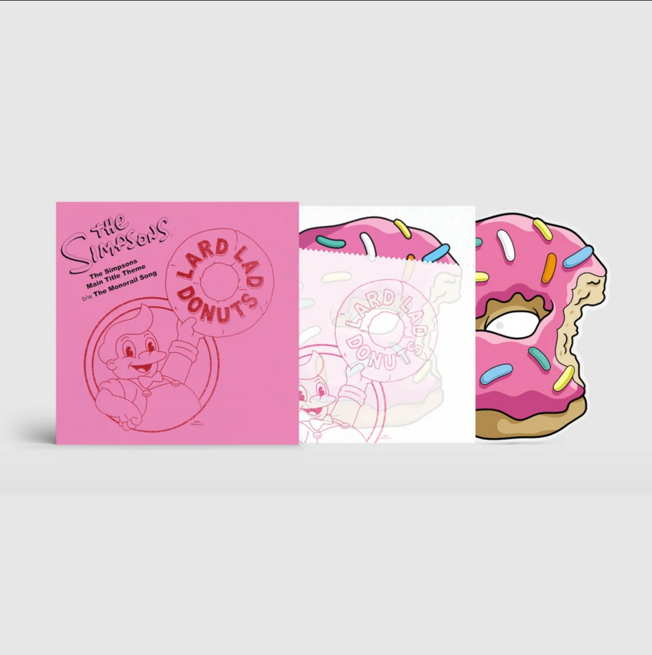 A shot of the Simpsons 10" record set showing the all pink front cover with an illustration of Lard Lad, the insertof the same illustration but made to look like a donut in a wrapper, and the 10" disc poking out that is a pink sprinkle donut diecut shape.