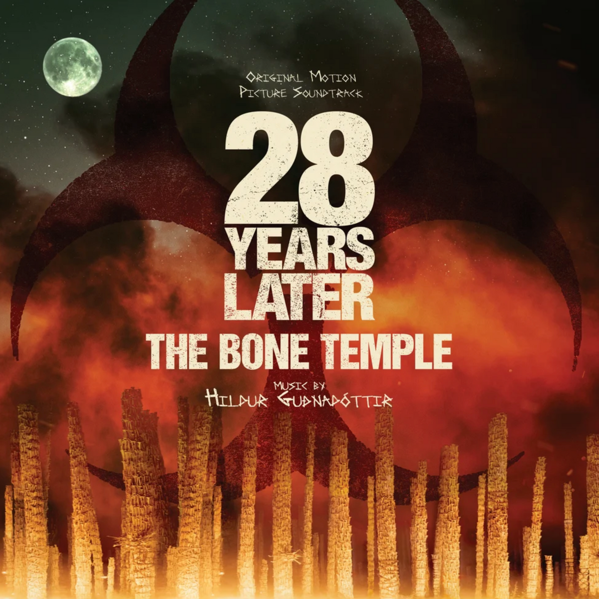 Album cover artwork for the original motion picture soundtrack to '28 Years Later: The Bone Temple', featuring distressed white title text over a fiery red and orange scene with a large biohazard symbol, a moon in the sky, and skeletal structures at the bottom.