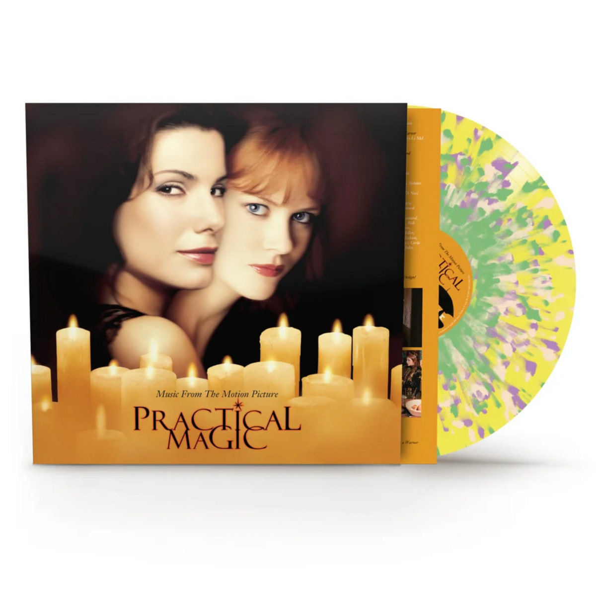 Album cover art for the music from the motion picture "Practical Magic", featuring Sandra Bullock and Nicole Kidman in profile with lit candles in the foreground and the title at the bottom. The multicolor splatter vinyl record and orange inner sleeve are sticking out of the jacket, all shot on a. white background.